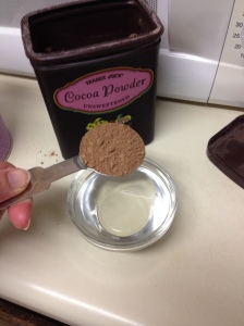 Mix the cocoa powder in one tablespoon at a time